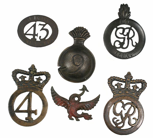 Grouping of British cartridge pouch badges