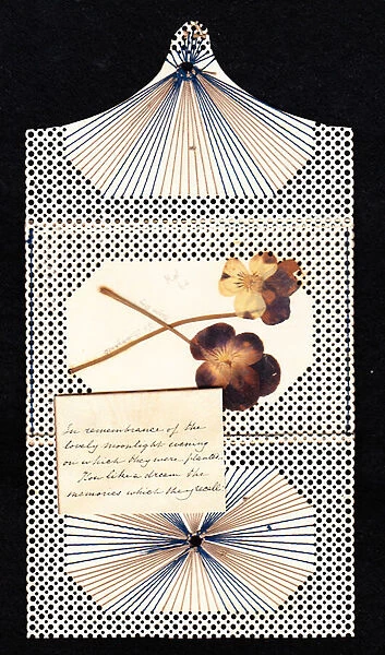 A hand-made Victorian Greeting card with pressed flowers retained from a romantic evening