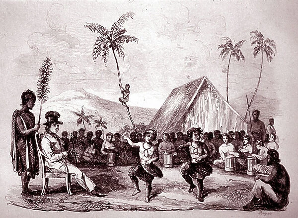 Hawaiian native dancers in ceremonial feathered attire