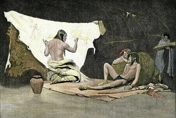 History of Indigenous Peoples: Indian Shaman using images on a buffalo skin to cure a young man's disease. Colourful engraving of the 19th century