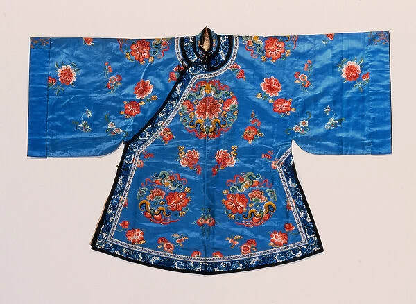 An informal robe of forget-me-not blue satin, embroidered in silks with peony