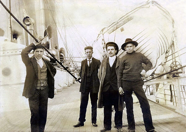 Italian emigrants on the deck of a ship in Le Havre, France, late 19th - early 20th century (b / w photo)