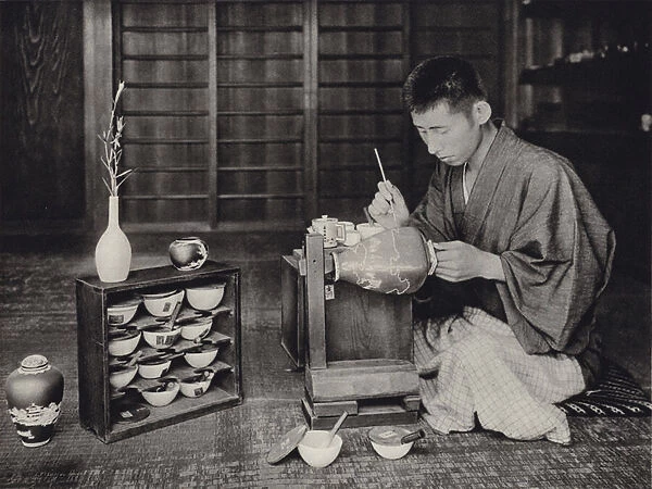 Japan in 1920s: Painting china (b  /  w photo)
