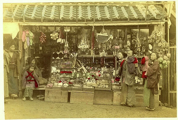 Japan: a bazaar with women and their children in front, 1875 - albumin paper enhances watercolor