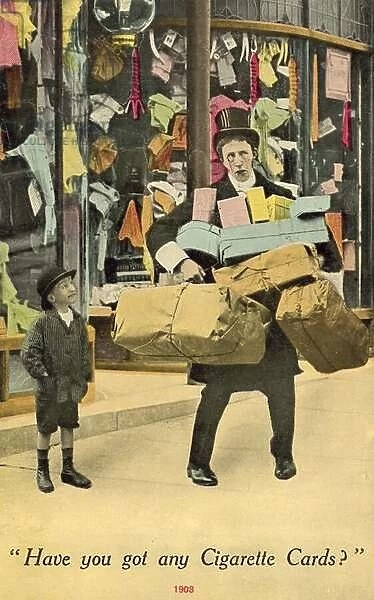 Man outside shop, carrying lots of parcels (colour photo)