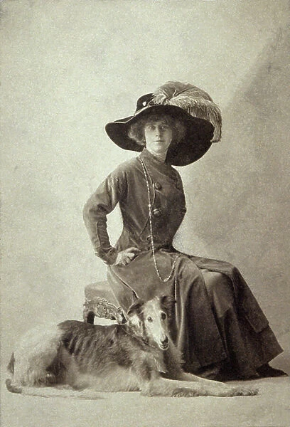 Natalie Clifford Barney with a greyhound, ca 1905 (b / w photo)