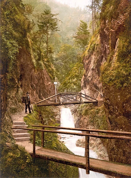Path and bridge in the Almbach Gorge in Berchtesgaden, Bavaria, 1890-1900 (chromolitho)