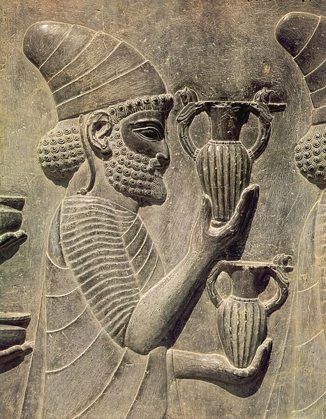 Phoenician carrying two vases as an offering, detail of the relief frieze on the east