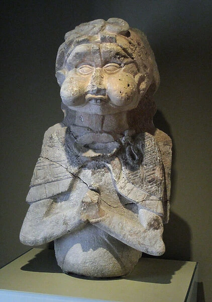 Piece of a statue of a young man, Oxkintok, Yucatan, Postclassic period, 900-1000 AD