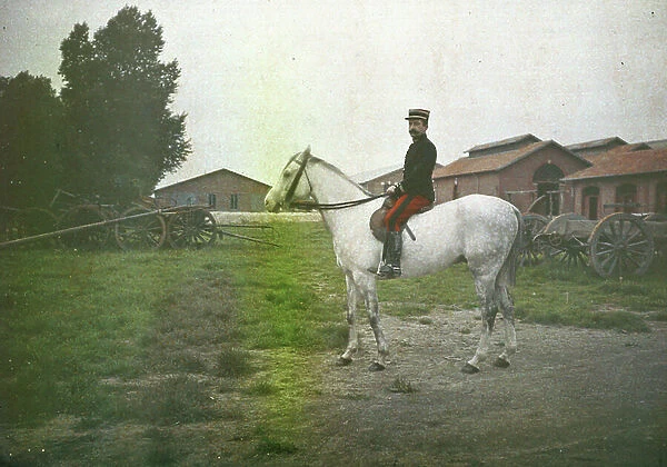 Portrait of a soldier: An officer poses on his horse in his barracks, 1910, France - Autochrome anonymous