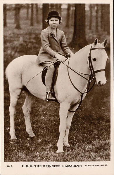 Princess Elizabeth (later Queen Elizabeth II) riding a white pony (b  /  w photo)