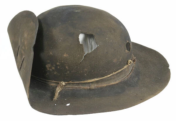 Round hat with bullet hole worn by Captain Phineas Meigs