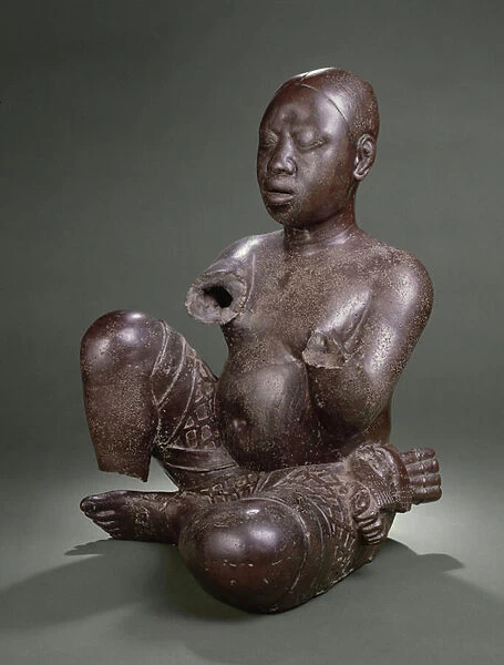 Seated figure, Tada, 13th - 14th century (copper)