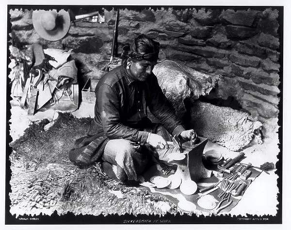 Silversmith at work, c. 1914 (b  /  w photo)