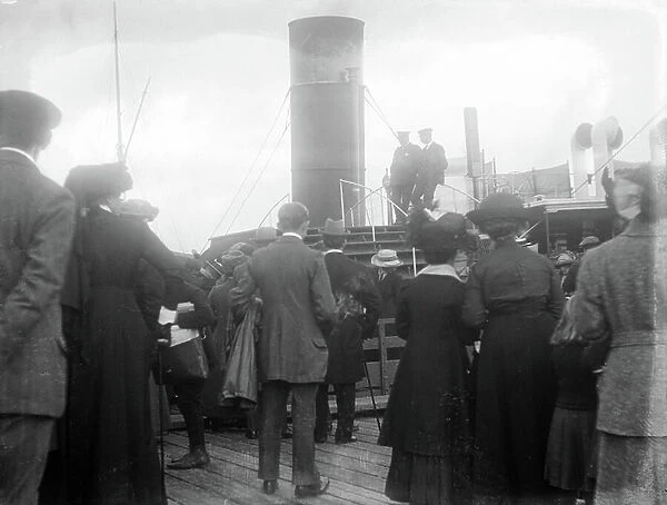 The steamboat 'Columba', in Tarbert (Scotland), sitting next to the chimney is the captain L. McTavish, 1912 (b / w photo)