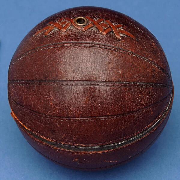 String dispenser in the shape of a football (leather)