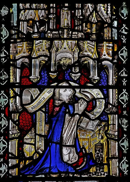 Window n4 depicting a cleric with scroll (stained glass)