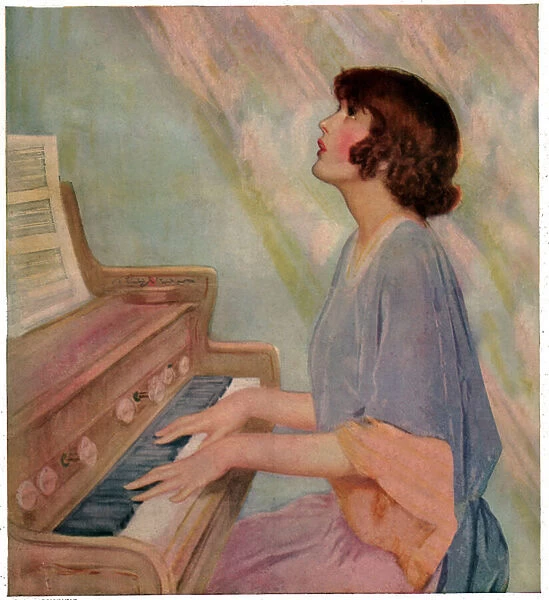 Woman playing the organ. 1924 (engraving)
