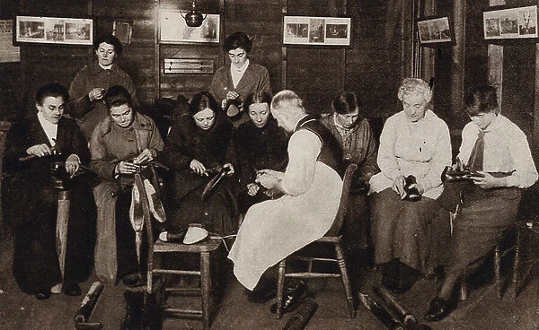 Women learning how to repair army boots, World War I (b / w photo)