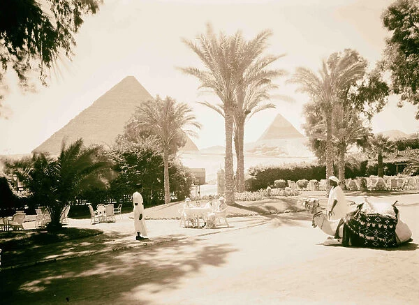 Egypt Cairo Hotels Mena House Front garden two pyramids