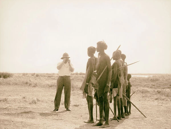 Sudan Malakal Passengers photographing Shiluki