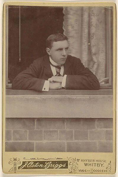 well-dressed young man posed window sill J Aston Briggs