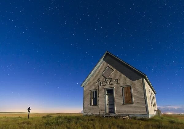 The 1909 Liberty School on the Canadian Prarie in moonlight with Big Dipper