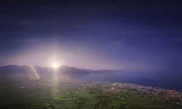 Aerial view of mountains and sea at sunset from Mount Vesuvius, Italy