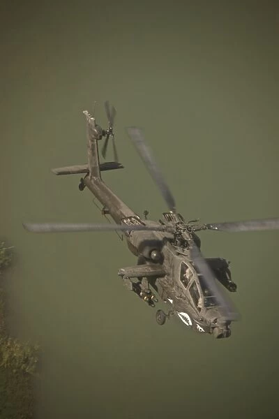 An AH-64D Apache helicopter in flight over Northern Iraq