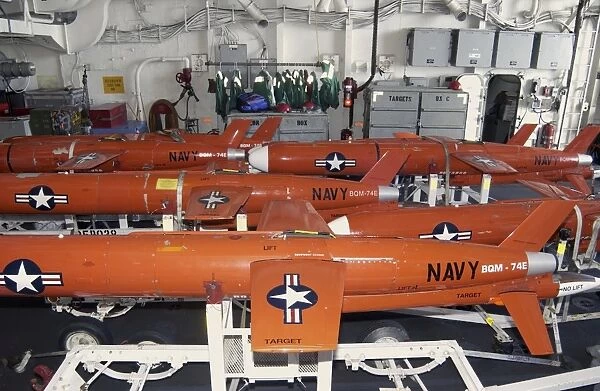 BQM-74E Chukar target drones stowed aboard USS Cushingas hanger bay