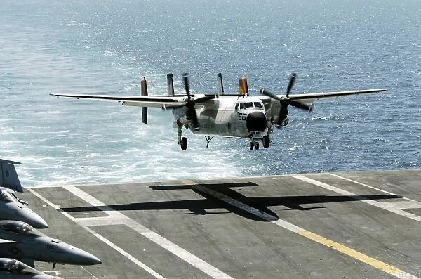 A C-2A Greyhound prepares to land on the flight deck of USS Dwight D. Eisenhower