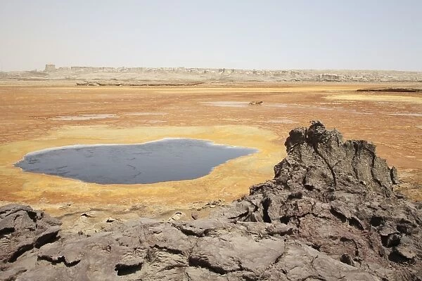 Dallol geothermal area, 1926 explosion crater by Black Mountain, Danakil Depression