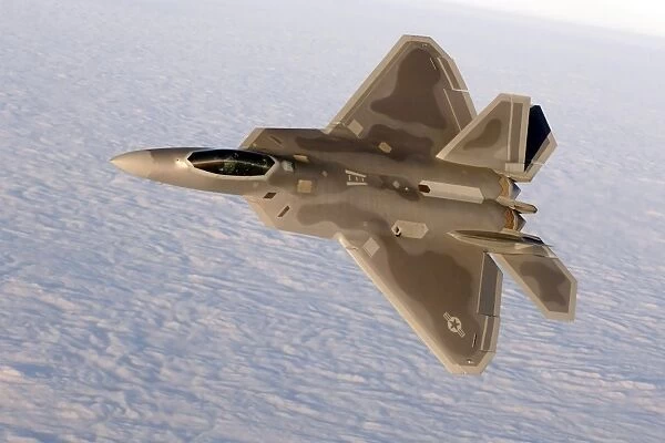 A F-22A Raptor aggressively banks