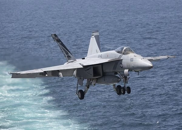 An F  /  A-18F Super Hornet takes off during flight operations in the Arabian Sea