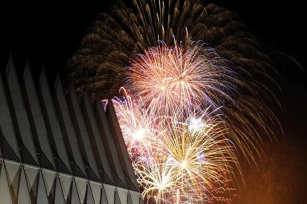 Fireworks explode over the Air Force Academy Cadet Chapel