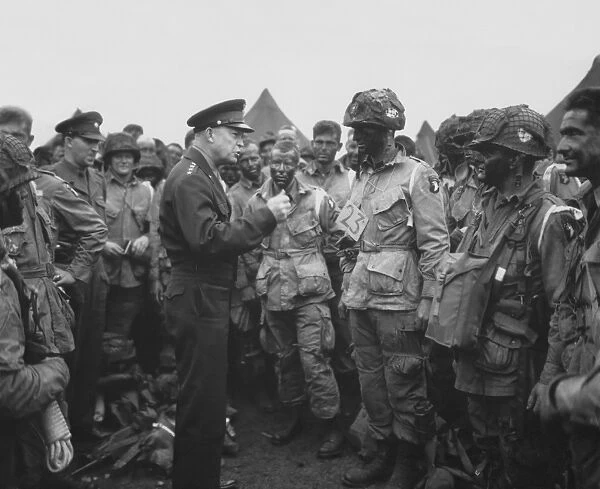 General Dwight D. Eisenhower talking with soldiers of the 101st Airborne Division