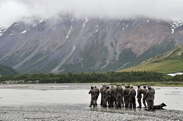 A group of Navy SEALs prepares to cross Phelan Creek