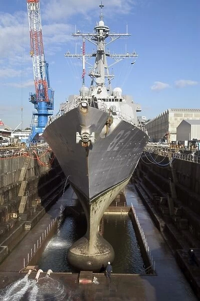 Guided missile destroyer USS Lassen enters a dry dock
