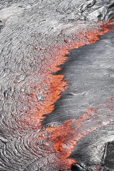 Lava flowing from under crust of lava lake, Erta Ale volcano, Danakil Depression