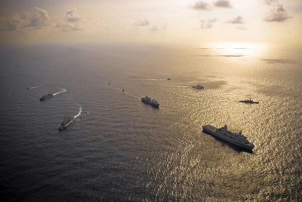 A multi-national naval force navigates the waters of the Caribbean Sea
