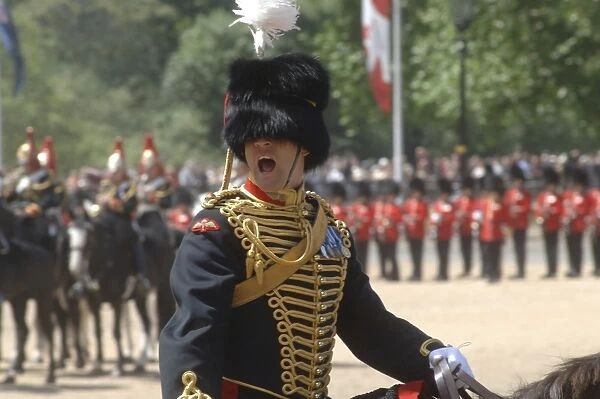 An officer shouts commands during the Trooping the Colour ceremony in London, England