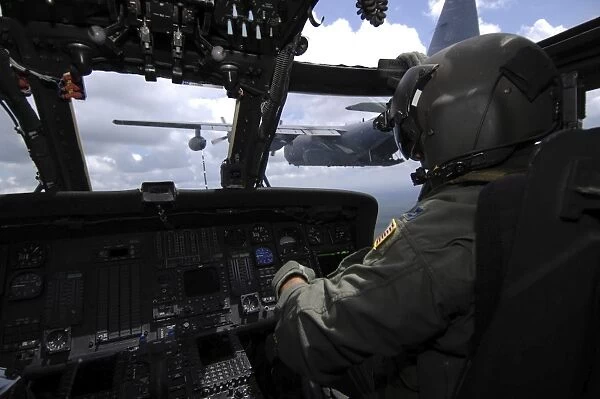 Pilot monitors the flight instruments in his HH-60 Pave Hawk