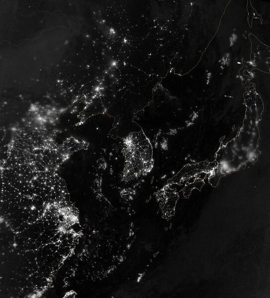 Satellite view of the Korean Peninsula showing city lights at night