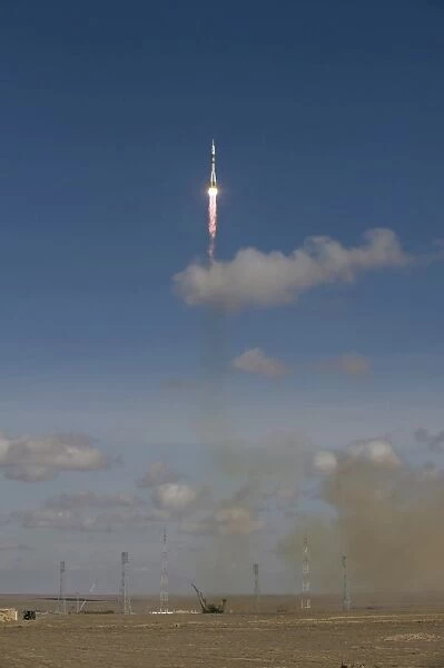 The Soyuz TMA-13 spacecraft launches from the Baikonur Cosmodrome in Kazakhstan
