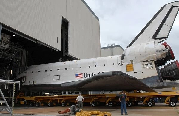 Space shuttle Atlantis rolls out of Orbiter Processing Facility 1 at Kennedy Space Center