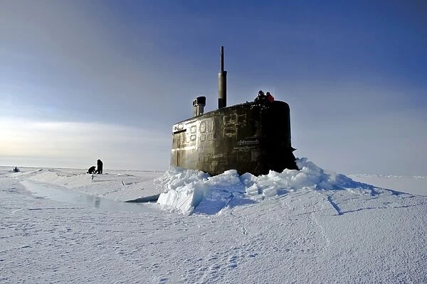 Submarine USS Connecticut surfaces above the ice