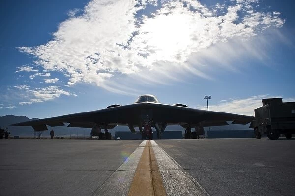 A U. S. Air Force B-2 Spirit is inspected by ground crews