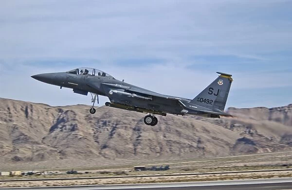 A U. S. Air Force F-15E Strike Eagle taking off from Nellis Air Force Base