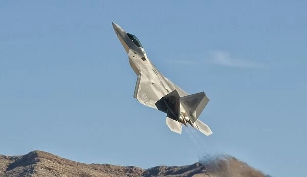 A U. S. Air Force F-22 Raptor takes off from Nellis Air Force Base, Nevada
