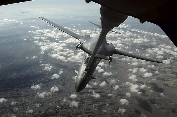 A U. S. Air Force KC-10 refuels a B-1B Lancer over Afghanistan